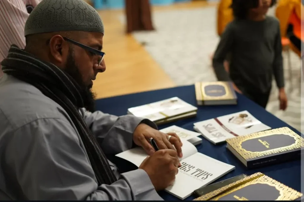 Ishaaq Jasat Author - signing books